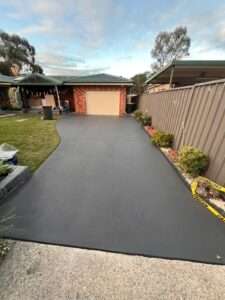 resurfaced or painted concrete driveway